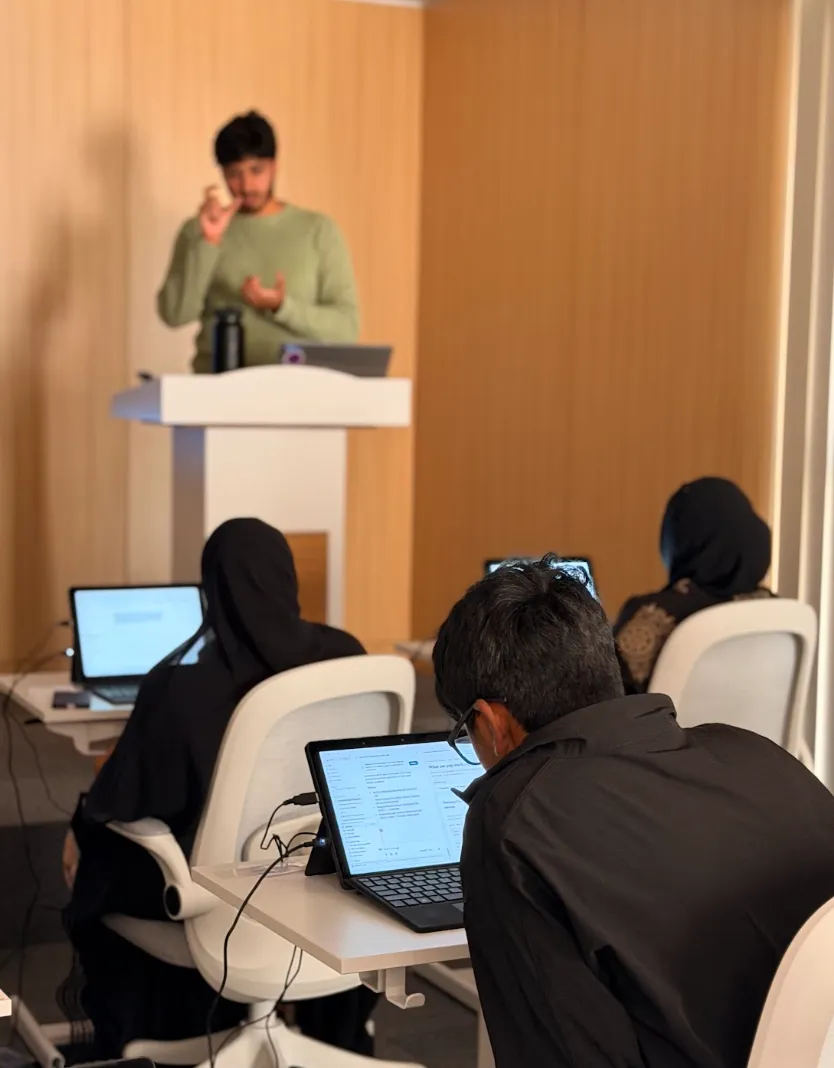 Deep focus, real results.Our participants diving into real-time AI prompts and workflows.